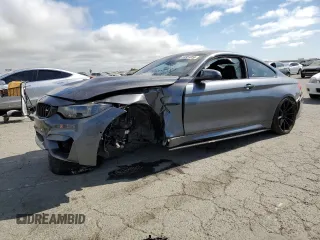 2015 BMW M4 with VIN WBS3R9C5XFF708690, listed as a Copart auction lot 54951254 with 42,105 mi miles and Salvage Title. Bid and sale history available at carsss.com. Image 1.