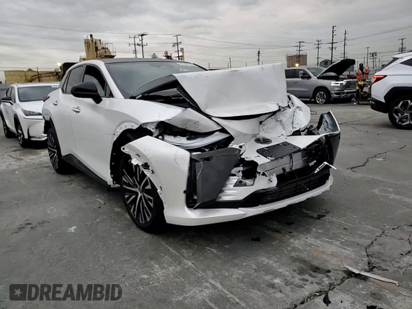 2023 Lexus RZ 450e Premium z VIN JTJAAAAB5PA009849, wystawiony jako Copart lot #81161103 z przebiegiem 4056 mil mil oraz . Historia ofert i sprzedaży dostępna na DreamBid. Obrazek 12.