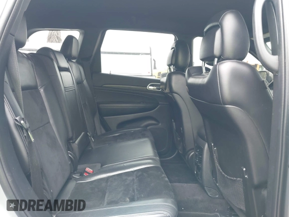 2017 Jeep Grand Cherokee Laredo with VIN 1C4RJEAG0HC702195, listed as a IAAI auction lot 42427597 with 104,403 mi miles and . Bid and sale history available at DreamBid. Image 8.