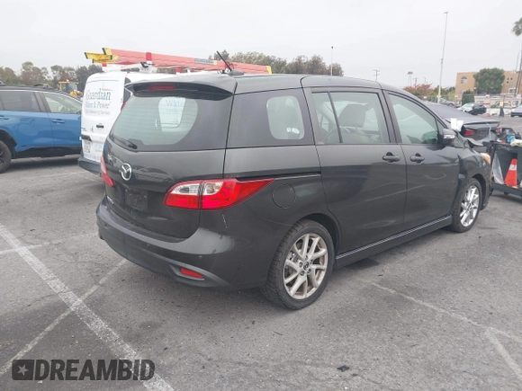 2013 Mazda 5 Grand Touring with VIN JM1CW2DL9D0158077, listed as a IAAI auction lot 42182079 with 153,431 mi miles and . Bid and sale history available at DreamBid. Image 4.