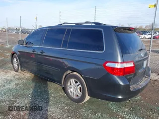 2006 Honda Odyssey EX-L with VIN 5FNRL38606B418349, listed as a IAAI auction lot 37968530 with 166,850 mi miles. Bid and sale history available at carsss.com. Image 3.
