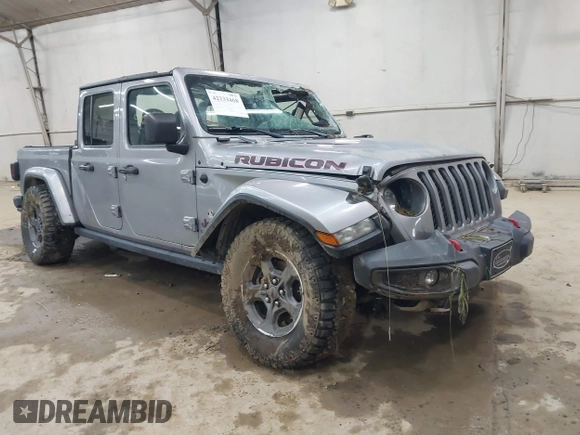 2020 Jeep Gladiator Rubicon with VIN 1C6JJTBGXLL136627, listed as a IAAI auction lot 42333468 with 74,717 mi miles and . Bid and sale history available at DreamBid. Image 1.