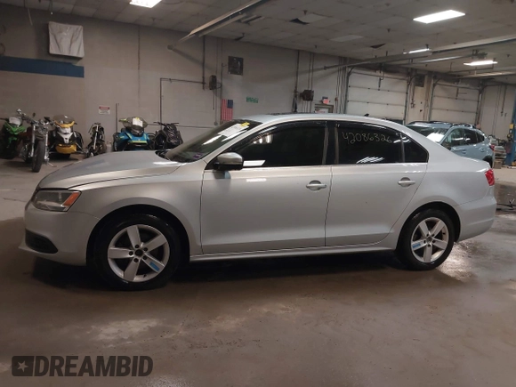 2014 Volkswagen Jetta TDI w/Premium with VIN 3VW3L7AJ6EM379401, listed as a IAAI auction lot 42086326 with 89,870 mi miles and . Bid and sale history available at DreamBid. Image 14.