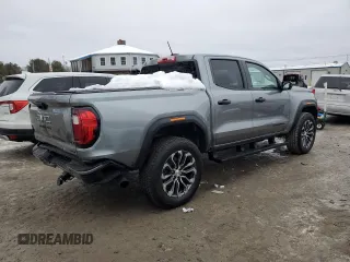 2024 GMC Canyon 4WD Denali with VIN 1GTP6FEK9R1152215, listed as a Copart auction lot 45130975 with 6,736 mi miles and Salvage Title. Bid and sale history available at carsss.com. Image 3.