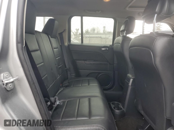 2015 Jeep Patriot High Altitude with VIN 1C4NJRFB2FD245075, listed as a Copart auction lot 46988625 with 103,443 mi miles and Salvage Title. Bid and sale history available at carsss.com. Image 12.
