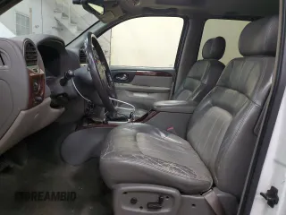 2003 GMC Envoy SLT с VIN 1GKET16S736148082, выставлен на аукционе Copart как лот 53889665 с пробегом 179 774 миль миль и Чистый • Clean title. История ставок и продаж доступна на DreamBid. Изображение 7.