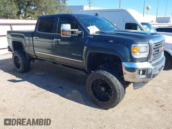 2018 GMC Sierra 2500HD SLT with VIN 1GT12TEY8JF139452, listed as a IAAI auction lot 41253932 with 202,672 mi miles. Bid and sale history available at carsss.com. Image 1.