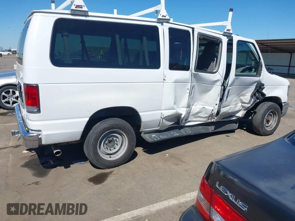 2014 Ford Econoline Passenger XL with VIN 1FBNE3BL7EDA37146, listed as a IAAI auction lot 41871526 with 139,387 mi miles. Bid and sale history available at carsss.com. Image 4.