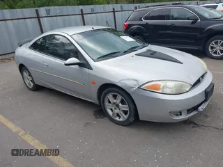 2002 Mercury Cougar z VIN 1ZWFT61L325609417, wystawiony jako IAAI lot #42119713 z przebiegiem 142 029 mil mil oraz . Historia ofert i sprzedaży dostępna na DreamBid. Obrazek 1.