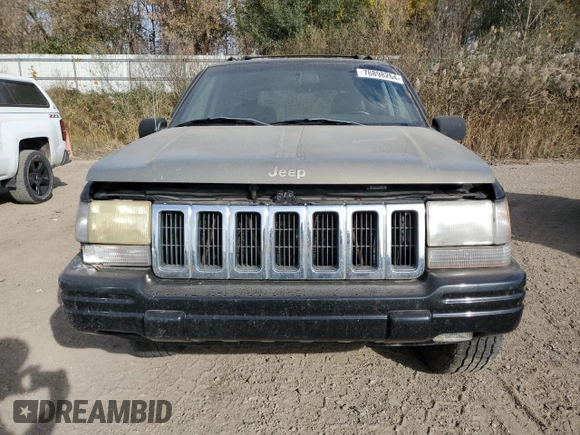 1998 Jeep Grand Cherokee Laredo with VIN 1J4GZ48YXWC299827, listed as a Copart auction lot 76898264 with 232,656 mi miles and Clean Title. Bid and sale history available at carsss.com. Image 5.