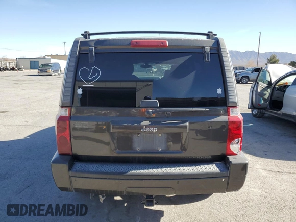 2006 Jeep Commander with VIN 1J8HH48K26C263986, listed as a Copart auction lot 84712294 with 216,923 mi miles and Salvage title. Bid and sale history available at DreamBid. Image 6.