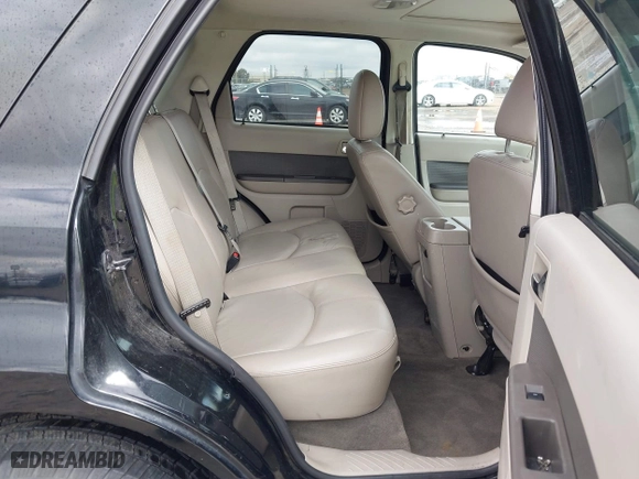 2009 Mercury Mariner Hybrid with VIN 4M2CU29319KJ18127, listed as a IAAI auction lot 41830660 with 273,438 mi miles. Bid and sale history available at carsss.com. Image 8.