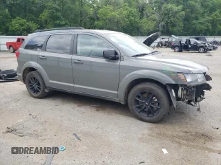 2019 Dodge Journey SE with VIN 3C4PDCBB0KT875474, listed as a Copart auction lot 52987395 with 76,816 mi miles and Salvage Title. Bid and sale history available at DreamBid. Image 4.
