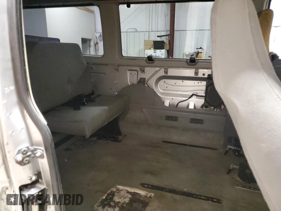 2005 Ford Econoline Passenger XL with VIN 1FBNE31L85HA52006, listed as a Copart auction lot 70610014 with 182,806 mi miles and Clean Title. Bid and sale history available at carsss.com. Image 10.
