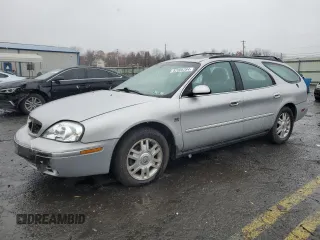 2004 Mercury Sable LS Premium with VIN 1MEHM59S54A605655, listed as a Copart auction lot 82005284 with 101,723 mi miles and Salvage Title. Bid and sale history available at DreamBid. Image 1.