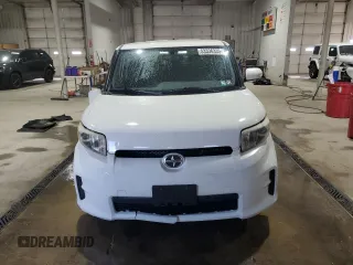 2011 Scion xB z VIN JTLZE4FE6B1125993, wystawiony jako Copart lot #53336335 z przebiegiem 229 378 mil mil oraz Szkoda całkowita • Salvage title. Historia ofert i sprzedaży dostępna na DreamBid. Obrazek 5.