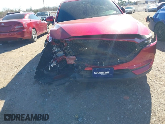 2019 Mazda CX-5 Sport with VIN JM3KFBBM2K0508743, listed as a IAAI auction lot 41288659 with 77,710 mi miles and . Bid and sale history available at DreamBid. Image 6.