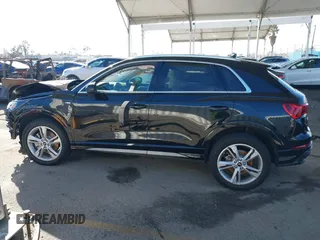 2021 Audi Q3 S line Premium Plus z VIN WA1EECF37M1095208, wystawiony jako IAAI lot #41616320 z przebiegiem 18 341 mil mil oraz . Historia ofert i sprzedaży dostępna na DreamBid. Obrazek 14.