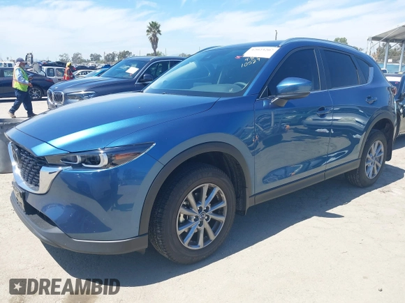 2023 Mazda CX-5 S Select with VIN JM3KFBBM3P0208376, listed as a IAAI auction lot 42023207 with 20,114 mi miles and . Bid and sale history available at carsss.com. Image 2.