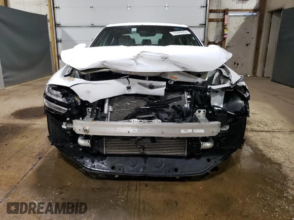 2023 Genesis G70 2.0T with VIN KMTG34TA9PU124418, listed as a Copart auction lot 60632694 with 23,798 mi miles and Salvage Title. Bid and sale history available at DreamBid. Image 5.
