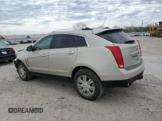 2015 Cadillac SRX Luxury Collection z VIN 3GYFNEE33FS606531, wystawiony jako Copart lot #53088485 z przebiegiem 115 140 mil mil oraz Szkody całkowita. Historia ofert i sprzedaży dostępna na DreamBid. Obrazek 2.