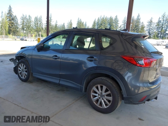 2016 Mazda CX-5 Sport with VIN JM3KE4BY1G0910102, listed as a IAAI auction lot 42115163 with 144,495 mi miles and . Bid and sale history available at carsss.com. Image 3.
