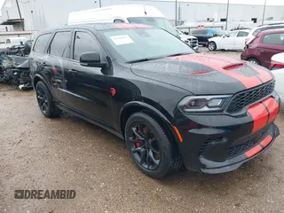 2023 Dodge Durango SRT Hellcat Premium with VIN 1C4SDJH99PC584770, listed as a IAAI auction lot 41562157 with 14,598 mi miles and . Bid and sale history available at DreamBid. Image 1.