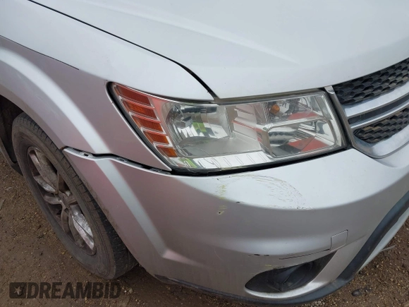 2013 Dodge Journey SXT with VIN 3C4PDCBG1DT647014, listed as a IAAI auction lot 42006636 with 192,911 mi miles. Bid and sale history available at carsss.com. Image 6.