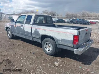 1995 Dodge Dakota with VIN 1B7GL23X4SS283696, listed as a IAAI auction lot 41915325 with 305,457 mi miles. Bid and sale history available at carsss.com. Image 3.
