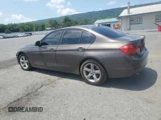 2014 BMW 3 Series 328i xDrive with VIN WBA3B5C5XEP542908, listed as a Copart auction lot 62636965 with 141,520 mi miles and Clean title. Bid and sale history available at DreamBid. Image 2.