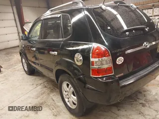 2007 Hyundai Tucson SE with VIN KM8JN12D97U636846, listed as a IAAI auction lot 41818368 with 199,996 mi miles. Bid and sale history available at carsss.com. Image 3.