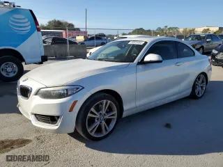 2015 BMW 2 Series 228i with VIN WBA1F5C59FV257321, listed as a Copart auction lot 80915464 with 113,776 mi miles and Salvage Title. Bid and sale history available at carsss.com. Image 1.