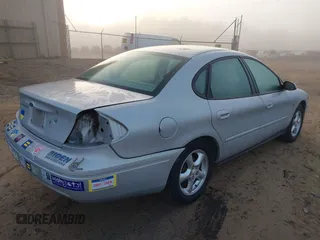 2004 Ford Taurus SES z VIN 1FAHP55S34G131304, wystawiony jako IAAI lot #41130286 z przebiegiem 112 404 mil mil oraz . Historia ofert i sprzedaży dostępna na DreamBid. Obrazek 4.