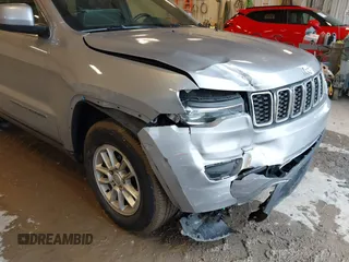 2019 Jeep Grand Cherokee Laredo E with VIN 1C4RJFAG8KC823814, listed as a IAAI auction lot 41728782 with 120,695 mi miles. Bid and sale history available at carsss.com. Image 6.