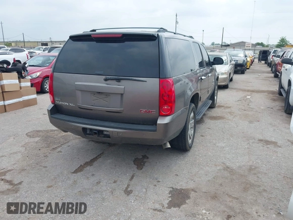 2011 GMC Yukon XL SLT z VIN 1GKS1KE07BR183572, wystawiony jako IAAI lot #42310565 z przebiegiem 341 982 mil mil oraz . Historia ofert i sprzedaży dostępna na DreamBid. Obrazek 4.