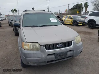 2001 Ford Escape XLT with VIN 1FMYU03141KB51890, listed as a IAAI auction lot 41621695 with 161,930 mi miles. Bid and sale history available at carsss.com. Image 1.