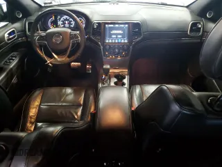 2018 Jeep Grand Cherokee Overland with VIN 1C4RJFCG5JC211145, listed as a Copart auction lot 54138865 with 115,679 mi miles and Salvage title. Bid and sale history available at DreamBid. Image 8.