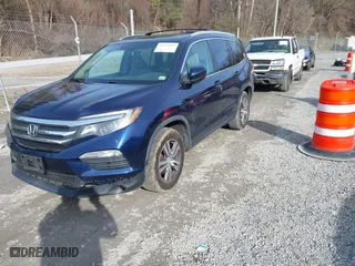 2017 Honda Pilot EX-L with VIN 5FNYF5H52HB031634, listed as a IAAI auction lot 41145133 with 164,668 mi miles. Bid and sale history available at carsss.com. Image 18.