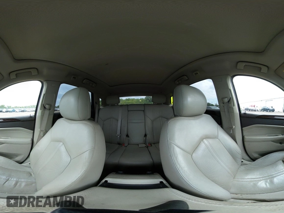 2010 Cadillac SRX Premium Collection with VIN 3GYFNFEY2AS562287, listed as a IAAI auction lot 42420409 with 195,694 mi miles and . Bid and sale history available at DreamBid. Image 18.