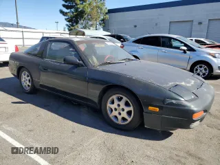 1992 Nissan 240SX SE Limited Edition z VIN JN1MS36PXNW115066, wystawiony jako Copart lot #80294264 z przebiegiem 91 190 mil mil oraz Szkody całkowita. Historia ofert i sprzedaży dostępna na DreamBid. Obrazek 4.