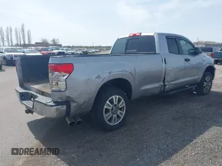 2012 Toyota Tundra 4WD Truck SR with VIN 5TFCW5F19CX012832, listed as a IAAI auction lot 41726453 with 232,078 mi miles. Bid and sale history available at carsss.com. Image 4.