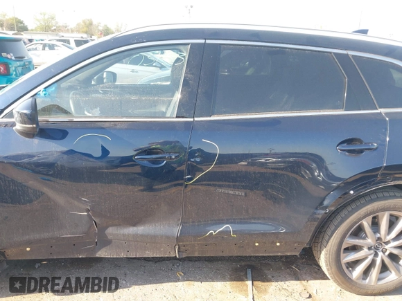 2020 Mazda CX-9 Grand Touring with VIN JM3TCADY0L0422548, listed as a IAAI auction lot 41839601 with 116,952 mi miles and . Bid and sale history available at DreamBid. Image 14.