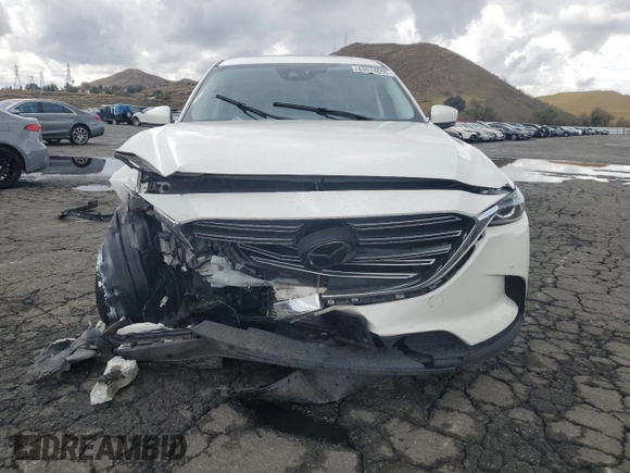 2021 Mazda CX-9 Touring with VIN JM3TCACY5M0527069, listed as a Copart auction lot 43014655 with 66,989 mi miles and Salvage title. Bid and sale history available at DreamBid. Image 5.