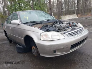 2000 Honda Civic EX with VIN 1HGEJ8643YL000579, listed as a IAAI auction lot 41947054 with 144,508 mi miles. Bid and sale history available at carsss.com. Image 1.