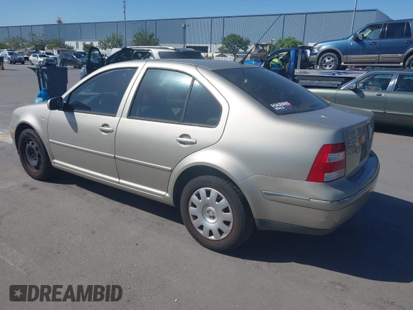 2004 Volkswagen Jetta GL z VIN 3VWRA69M64M039222, wystawiony jako IAAI lot #42262445 z przebiegiem 100 200 mil mil oraz . Historia ofert i sprzedaży dostępna na DreamBid. Obrazek 3.