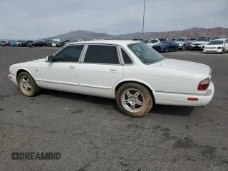 1999 Jaguar XJ with VIN SAJHX1048XC861105, listed as a Copart auction lot 50108225 with Not provided miles and Clean title. Bid and sale history available at DreamBid. Image 2.