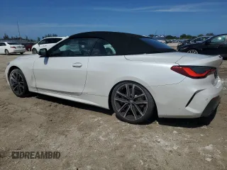 2023 BMW 4 Series 430i with VIN WBA23AT03PCL56790, listed as a Copart auction lot 55554825 with 9,747 mi miles and Salvage title. Bid and sale history available at DreamBid. Image 2.