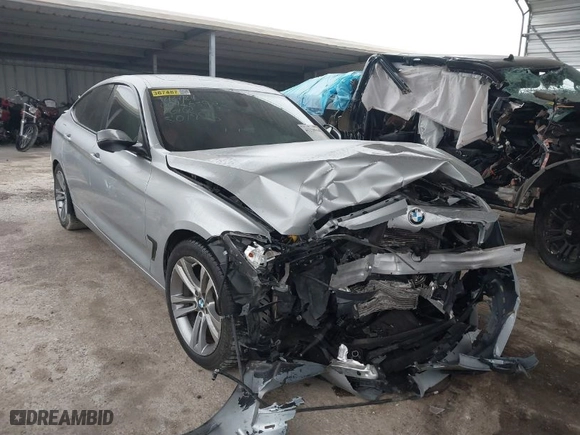 2016 BMW 3 Series Gran Turismo 328i xDrive with VIN WBA8Z5C59GG501996, listed as a IAAI auction lot 41238964 with 71,542 mi miles. Bid and sale history available at carsss.com. Image 1.