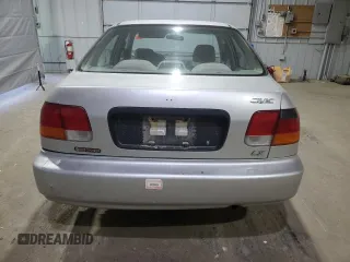 1998 Honda Civic LX with VIN 2HGEJ6675WH554442, listed as a Copart auction lot 53257865 with 104,597 mi miles and Clean Title. Bid and sale history available at DreamBid. Image 6.