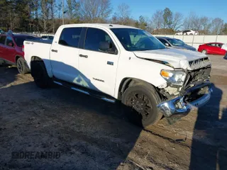 2014 Toyota Tundra 4WD Truck SR5 with VIN 5TFDW5F12EX328886, listed as a IAAI auction lot 41319788 with 325,987 mi miles. Bid and sale history available at carsss.com. Image 1.